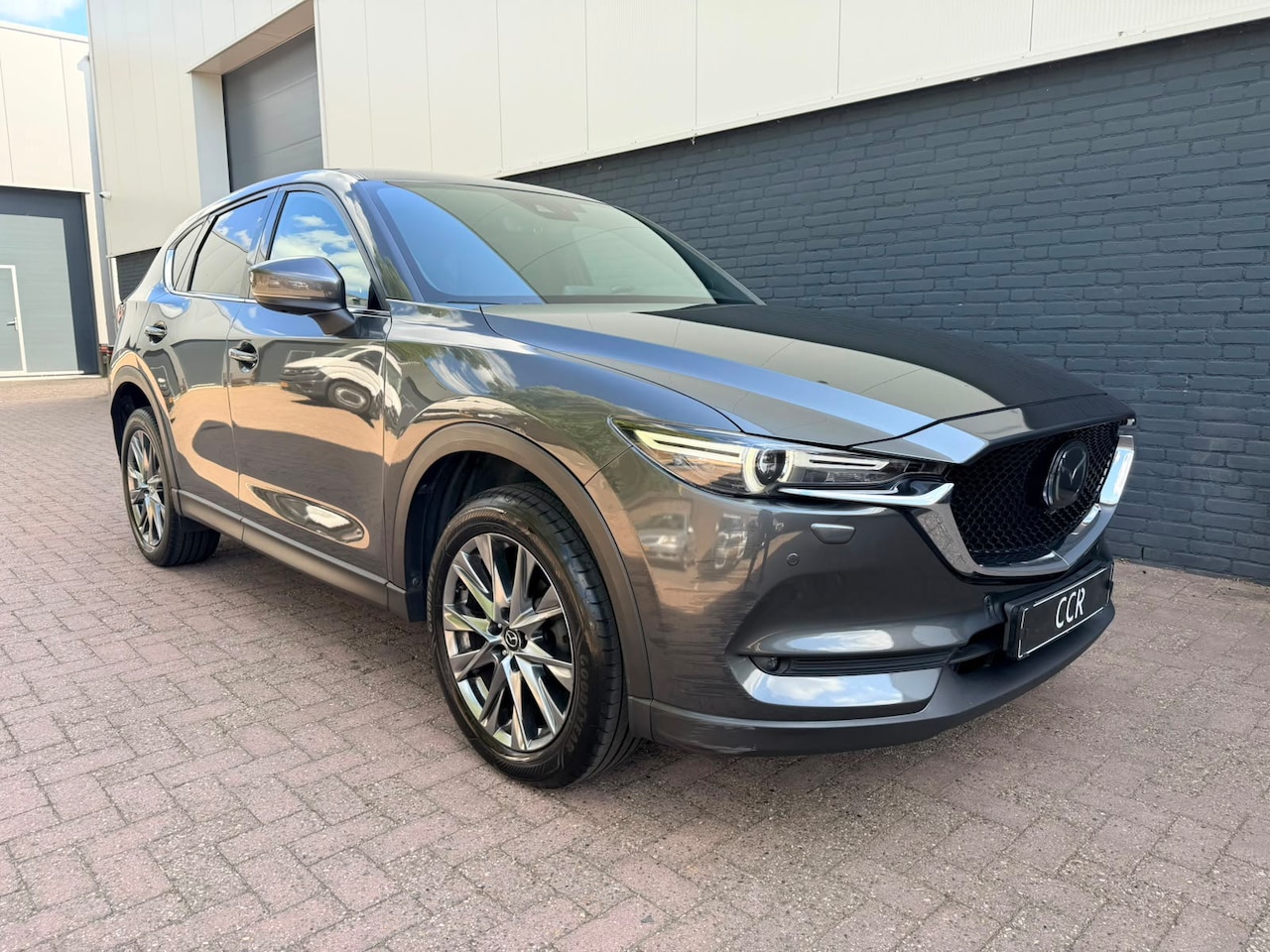 Mazda CX-5 - 2.0 SKYACTIV-G BTW ACC 360 CAMERA HUD BOSE LEER - AutoWereld.nl