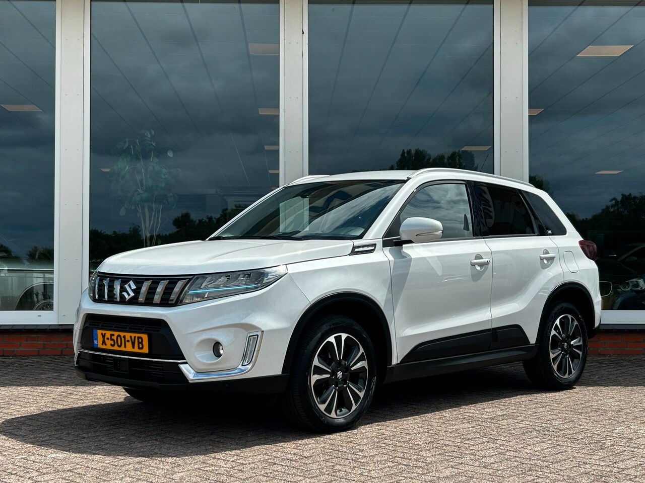 Suzuki Vitara - 1.4 Boosterjet Style Smart Hybrid - Navi - Leder - PDC - Camera - AutoWereld.nl