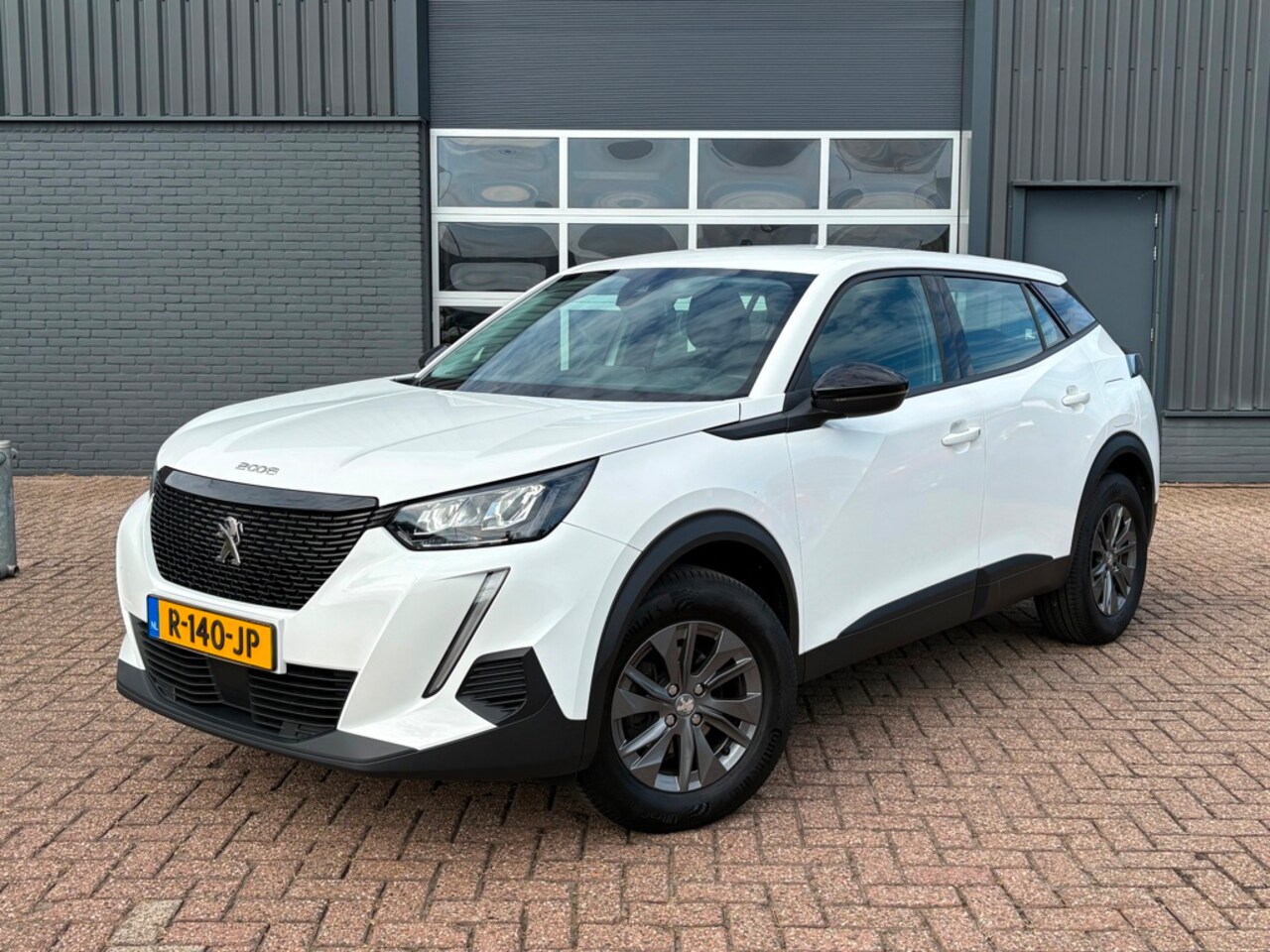 Peugeot 2008 - 1.2 PureTech Active Pack Climate control PDC Camera - AutoWereld.nl