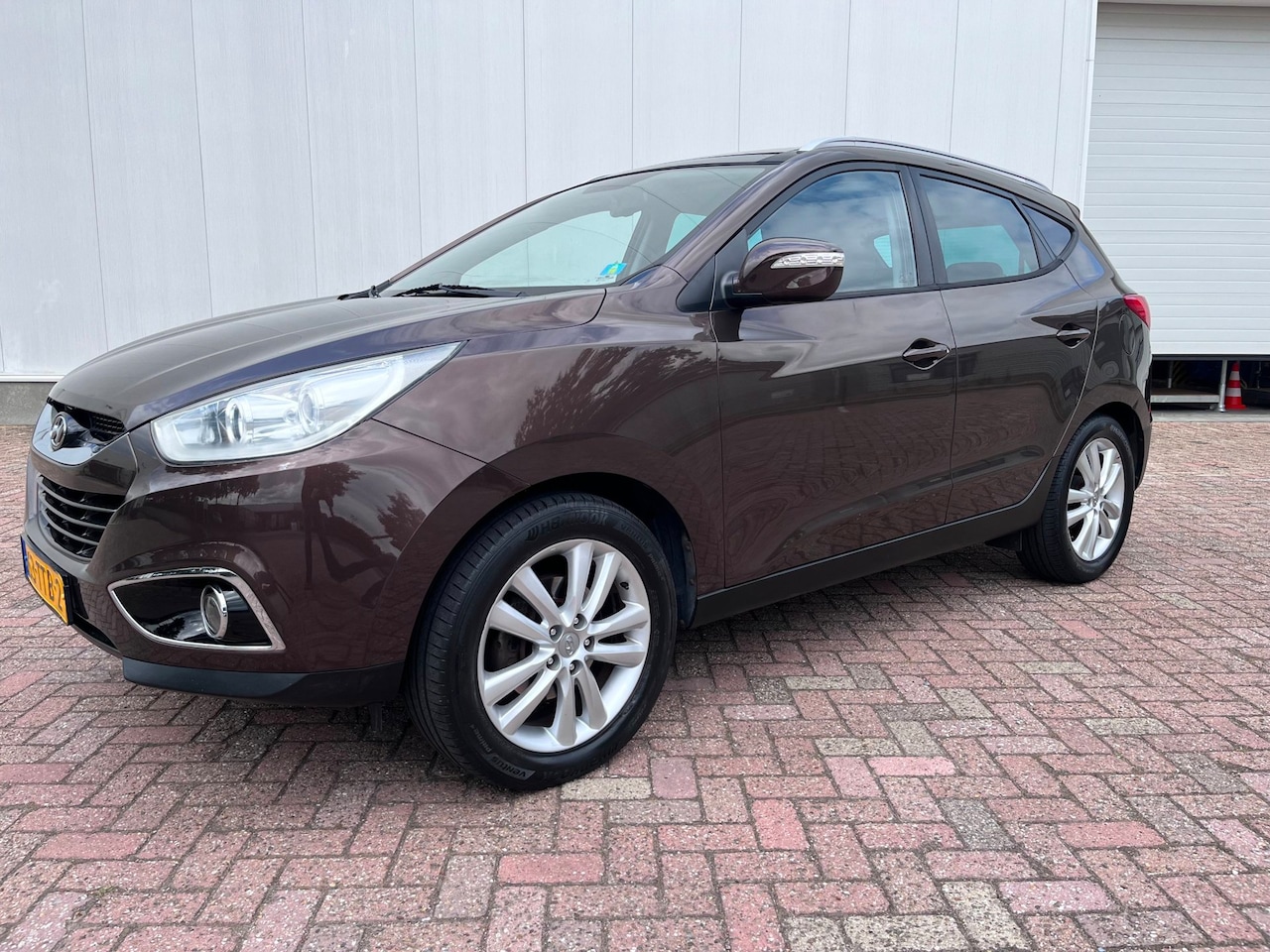 Hyundai ix35 - 2.0i i-Catcher automaat Panorama dak camera navigatie winterpakket 2012 - AutoWereld.nl
