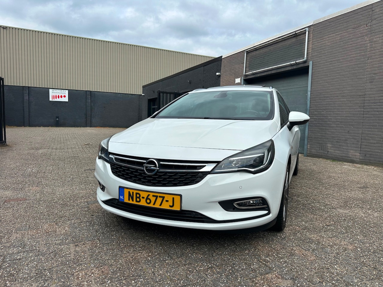 Opel Astra Sports Tourer - 1.4 Business+ Clima Cruise Navi Dak Led PDC LM-Wielen APK NAP. - AutoWereld.nl