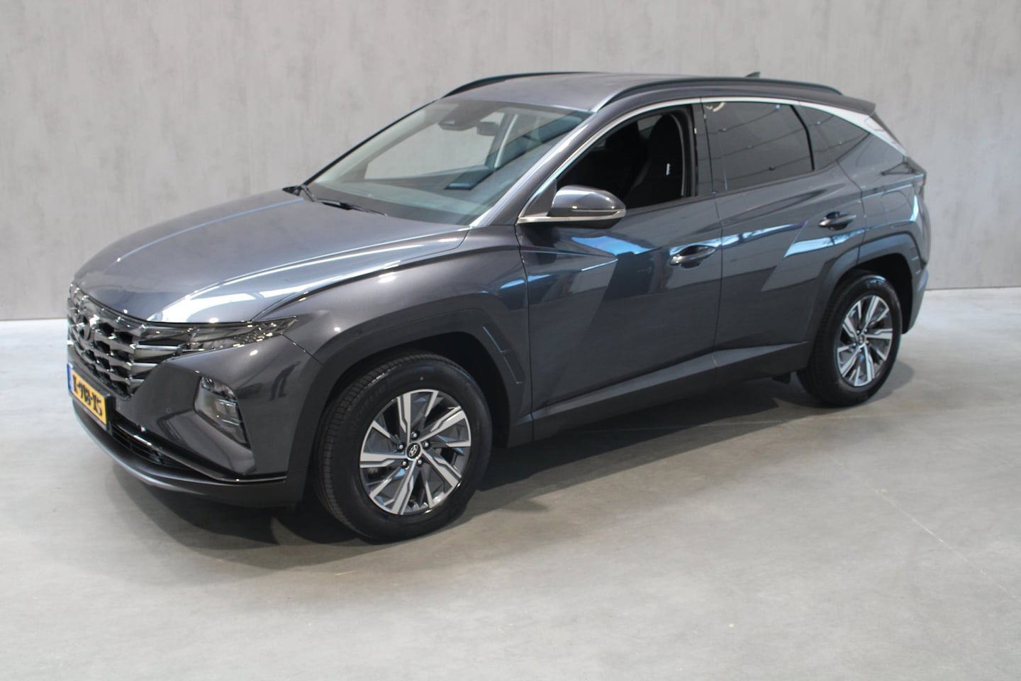 Hyundai Tucson - 1.6 T-GDI HEV Comfort Camera Prijs is Rijklaar incl 12 maanden bovag - AutoWereld.nl