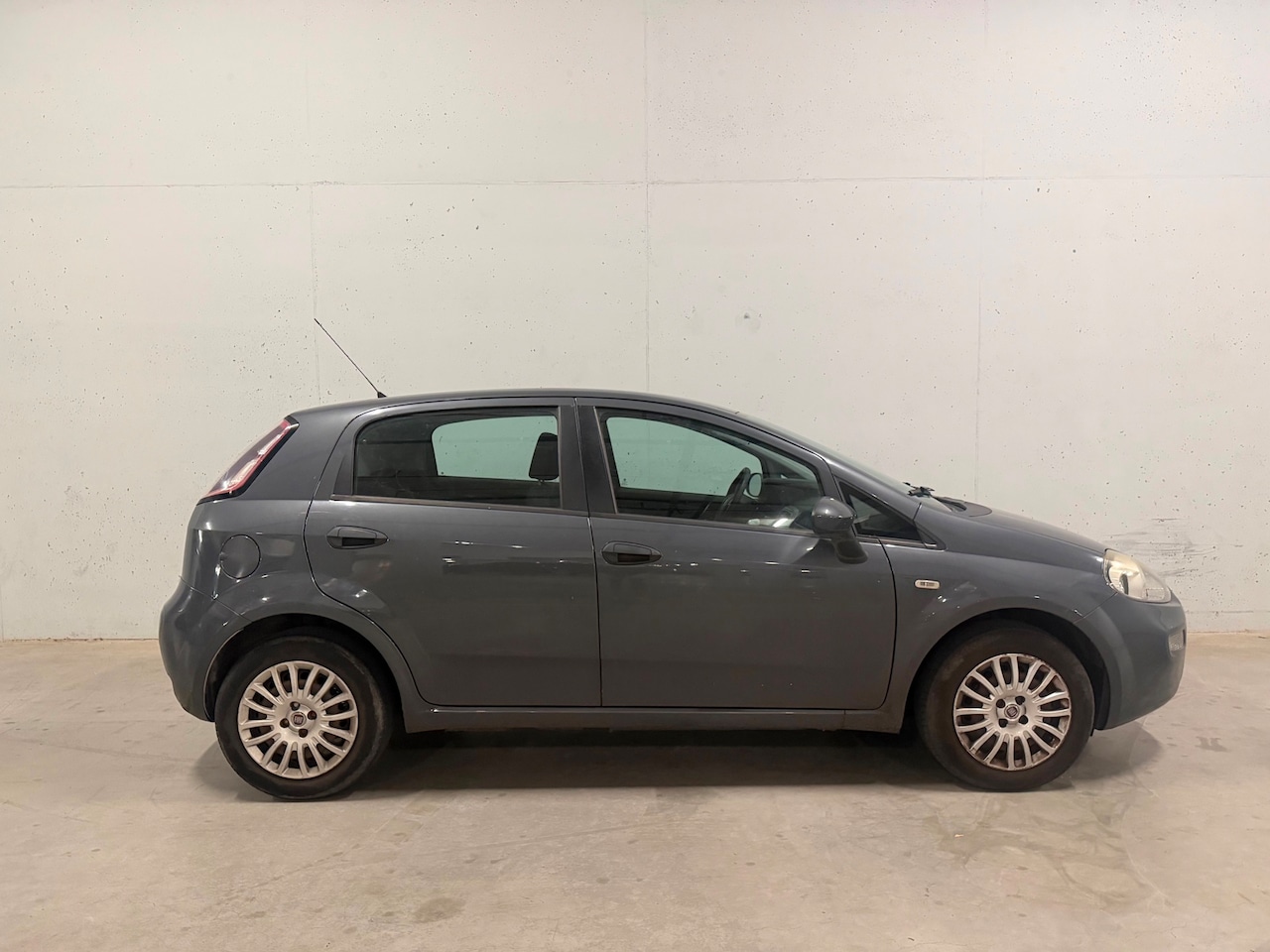 Fiat Punto Evo - 1.2 5drs. Airco APK NAP - AutoWereld.nl