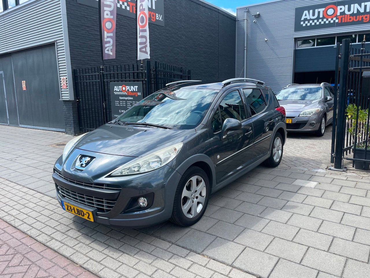 Peugeot 207 SW Outdoor - 1.6 VTi 3e Eigenaar! Trekhaak Airco Pano NAP APK - AutoWereld.nl