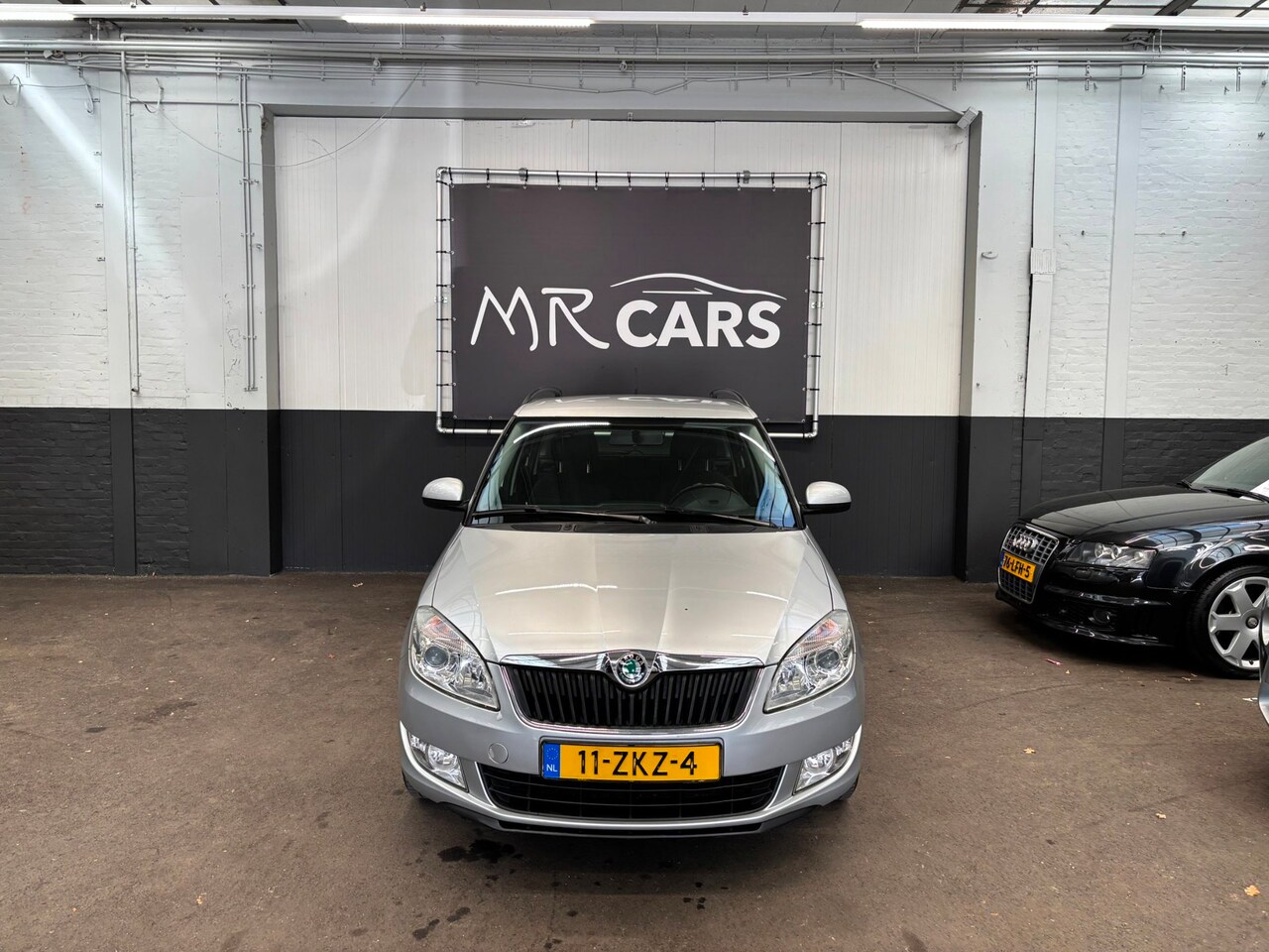 Skoda Fabia Combi - 1.2 TSI Ambition Businessline clima/cruise - AutoWereld.nl