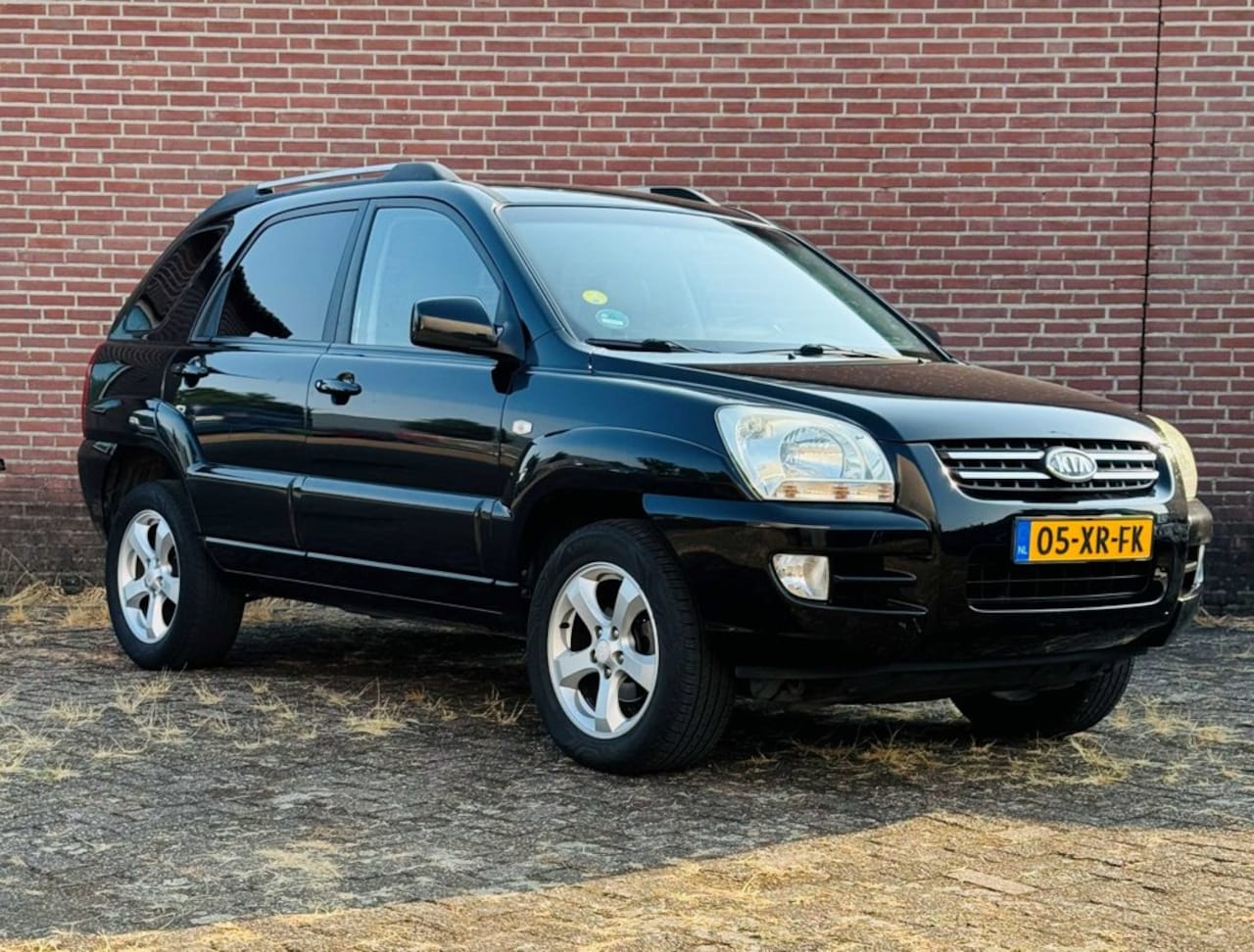 Kia Sportage - 2.0 CVVT Comfort 2.0 CVVT Comfort - AutoWereld.nl