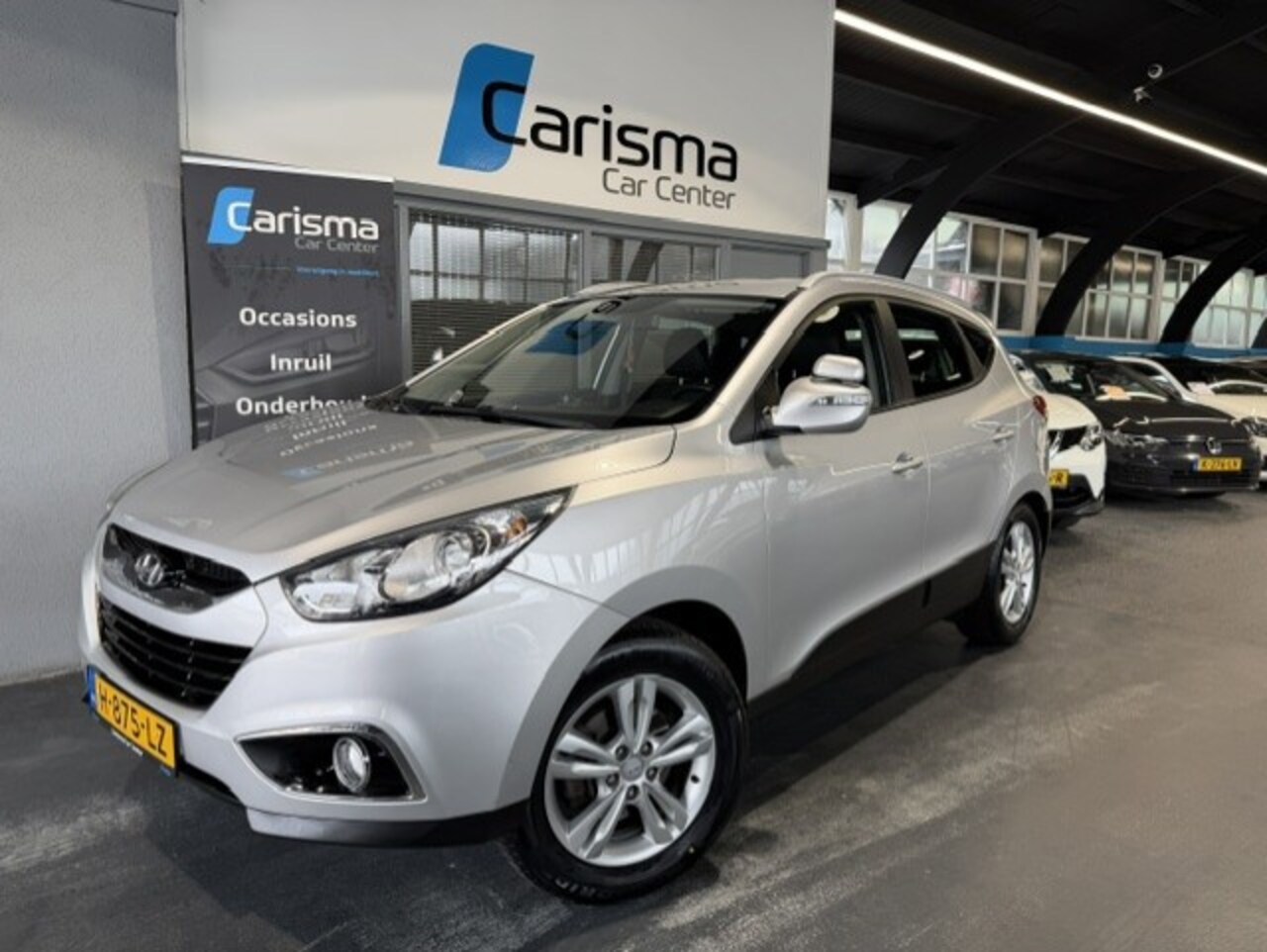 Hyundai ix35 - 2.0i 4WD Active Aut.|Leder|Airco|NW APK - AutoWereld.nl
