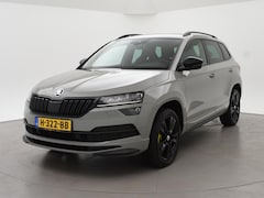 Skoda Karoq - 1.5 TSI ACT SPORTLINE + WEGKL. TREKHAAK | VOL LEDER | ADAPTIVE CRUISE | CANTON | CAMERA