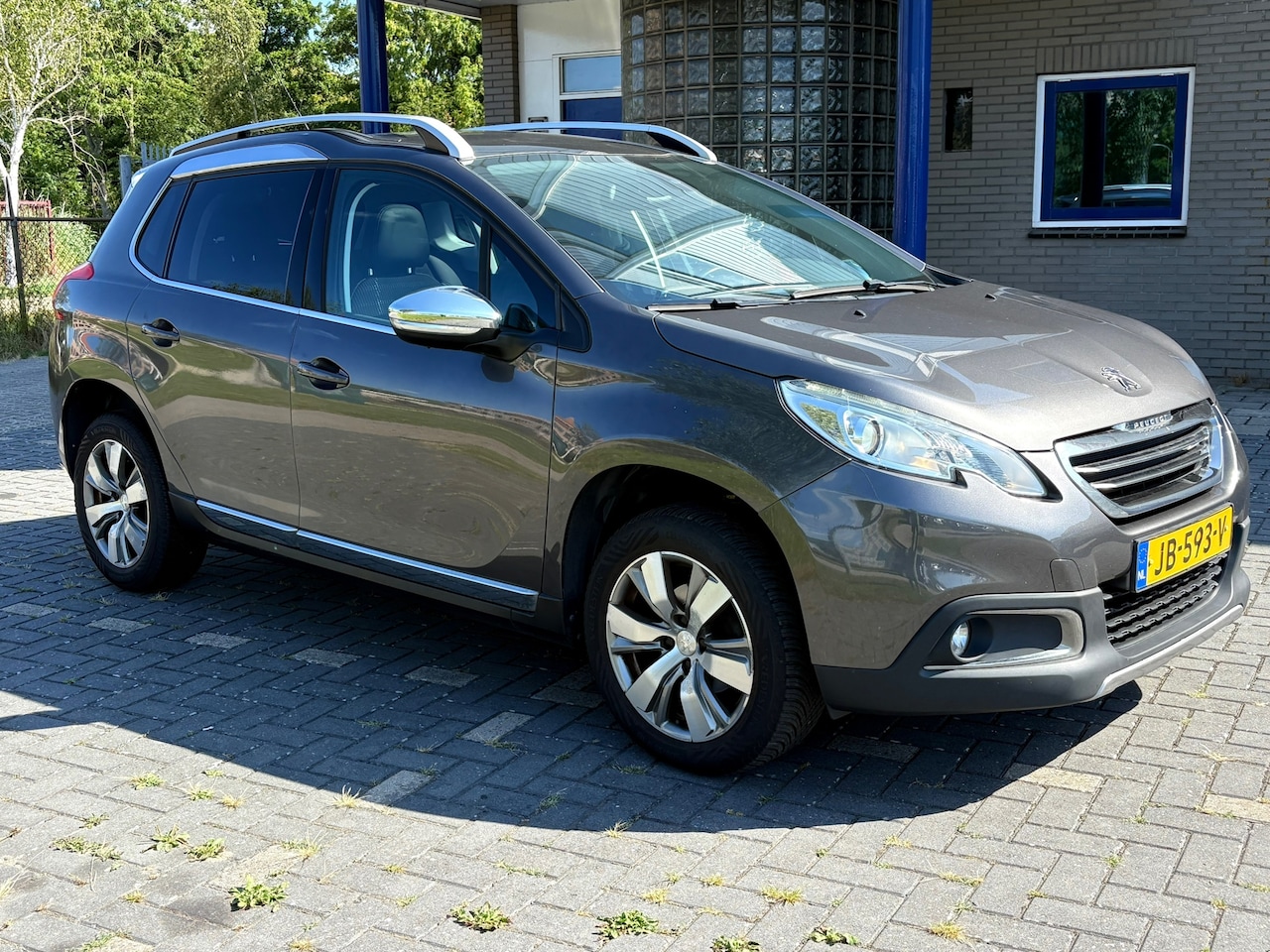 Peugeot 2008 - 1.2 PureTech Allure/Navi/Aut/Leer/park Snr/NAP - AutoWereld.nl