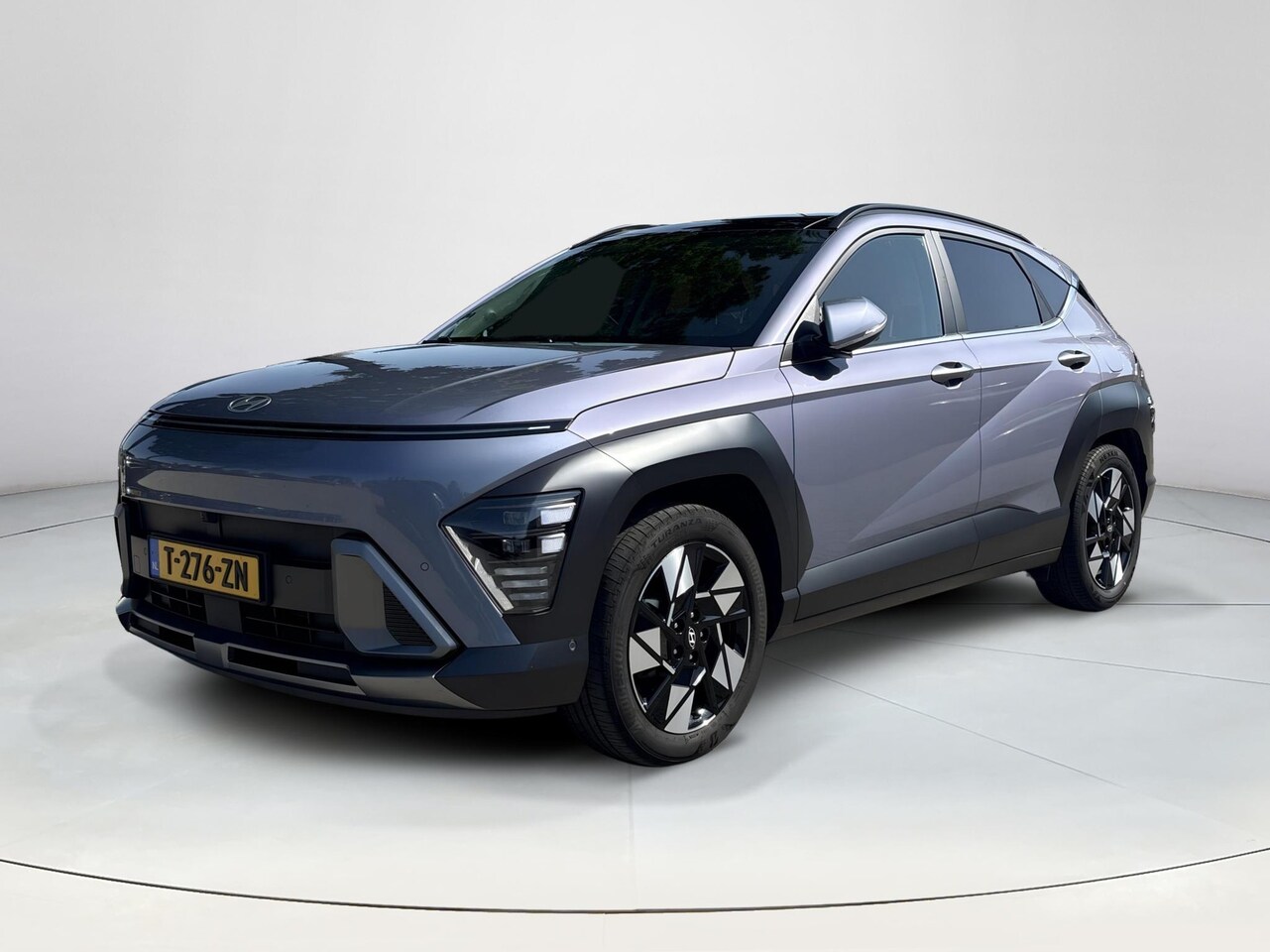 Hyundai Kona - 1.6 GDI HEV Premium Sky | Panoramadak | Trekhaak | Stoelverwarming | Full Option | - AutoWereld.nl