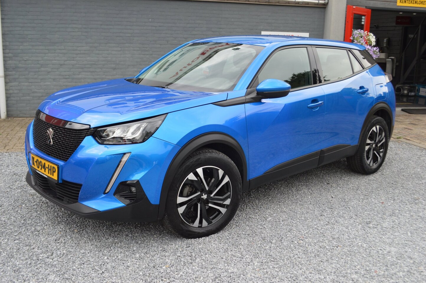 Peugeot 2008 - 1.2 PureTech Airco | Navi | 34.000 KM | Nieuwstaat | Carplay |Model 2022 - AutoWereld.nl