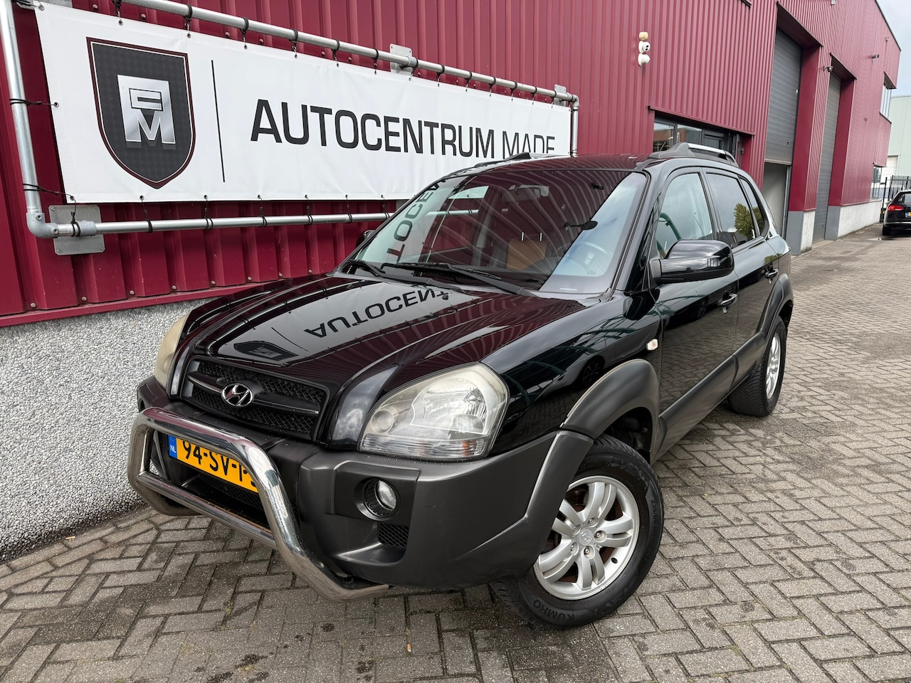 Hyundai Tucson - 2.0i Style World Cup edition // Leer // Clima // PDC // Trk.Hk - AutoWereld.nl