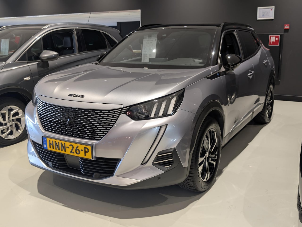 Peugeot e-2008 - EV GT 50 kWh 97,9% SOH | Stoelverwarming | Camera | Carplay | Adaptive Cruise Control - AutoWereld.nl