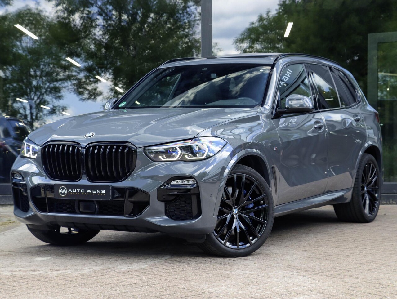 BMW X5 - M50i 530pk | Achterasbesturing | Laser | ACC | Sky Lounge | Grigrio Telesto - AutoWereld.nl