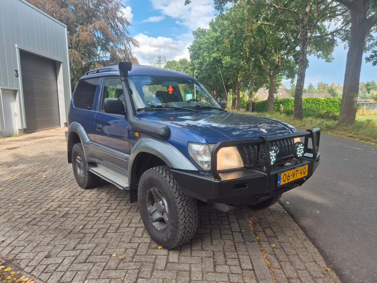 Toyota Land Cruiser 90 - LandCruiser 3.0 D4-D 4X4 OFFROAD AIRCO WEBASTO SNORKEL AUTOPILOT - AutoWereld.nl