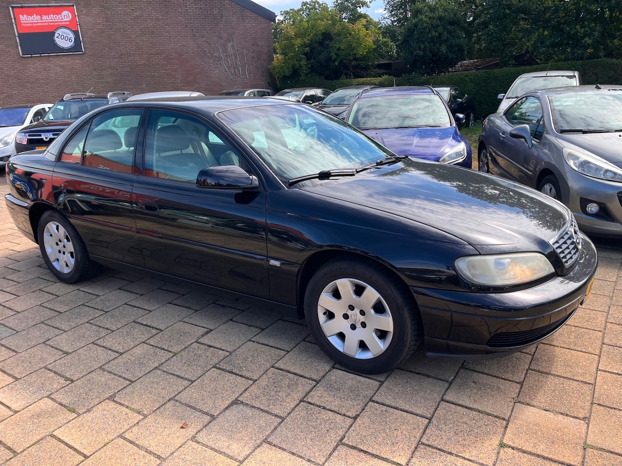 Opel Omega - 2.6i V6 Onyx Edition 2.6i V6 Onyx Edition - AutoWereld.nl
