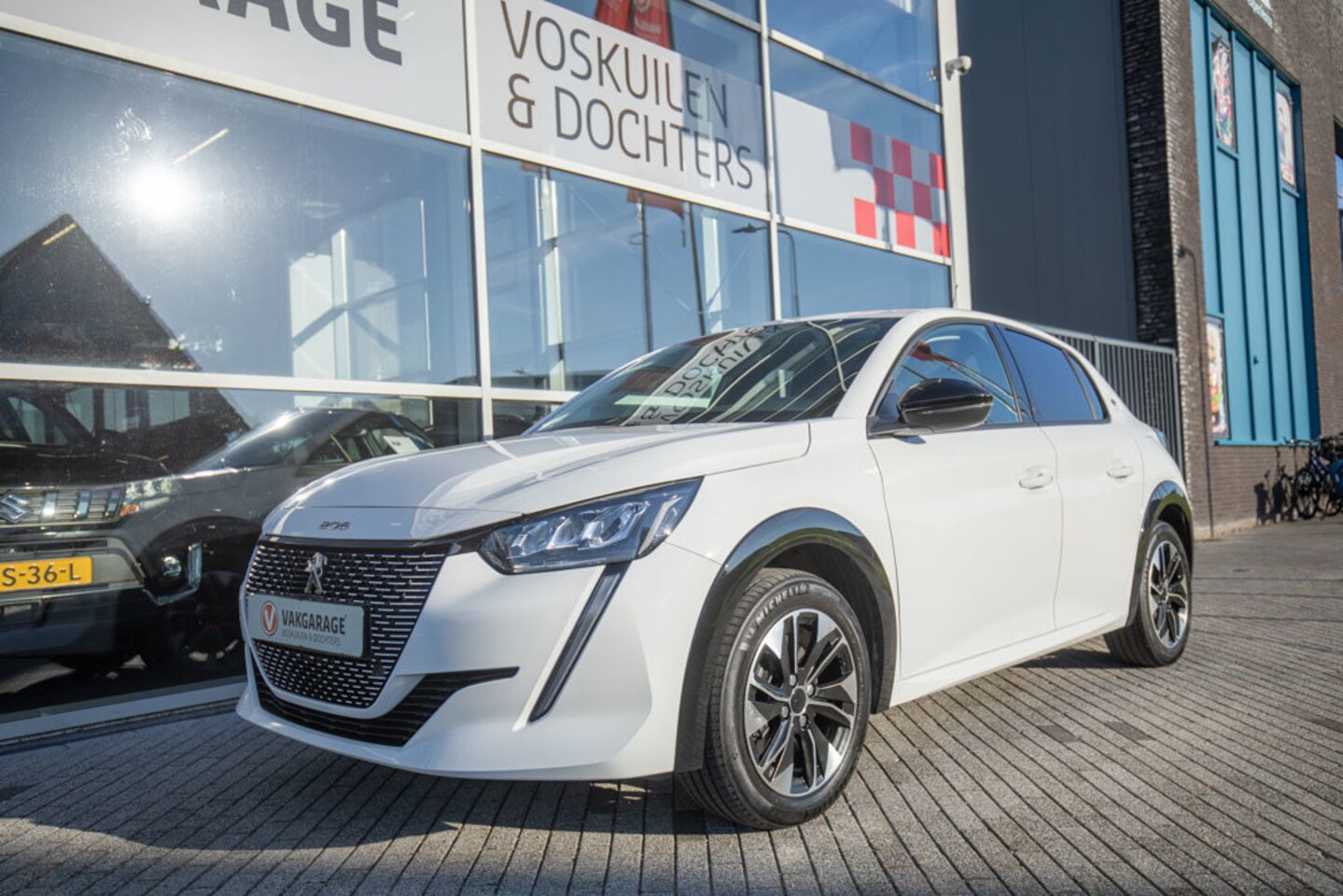 Peugeot e-208 - EV Allure Pack 50 kWh - AutoWereld.nl