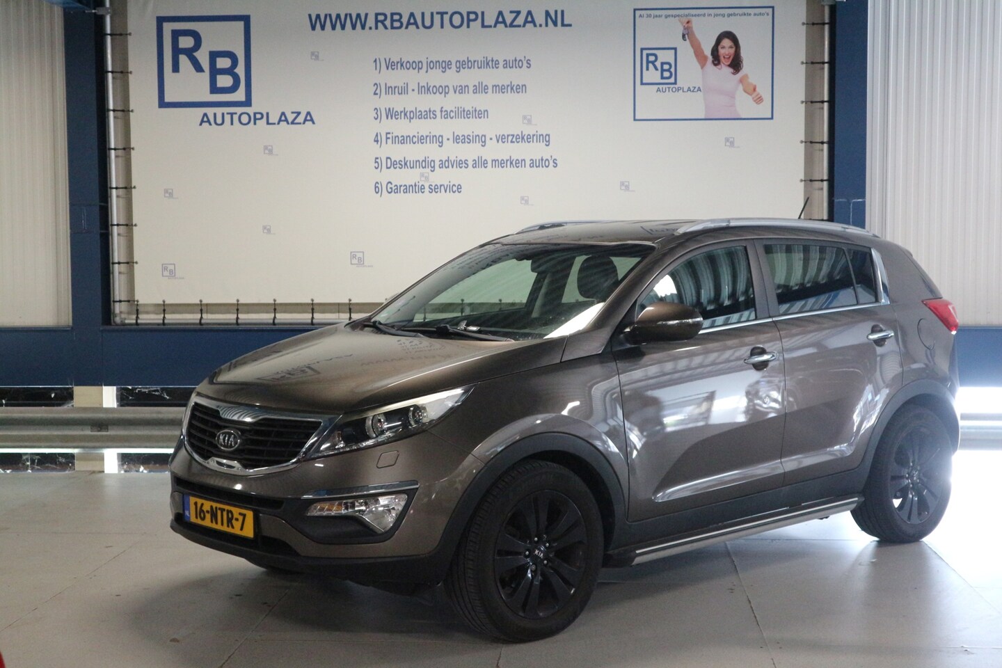 Kia Sportage - 2.0 X-clusive / AUTOMAAT / LEER / NAV ! ! ! - AutoWereld.nl