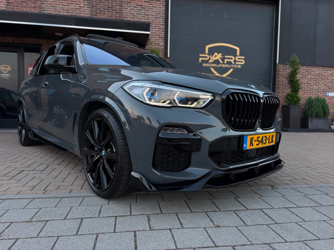 BMW X5 - XDrive45e High Executive + M Performance Dravitgrau Laserlight Sky Lounge Panoramadak Body - AutoWereld.nl