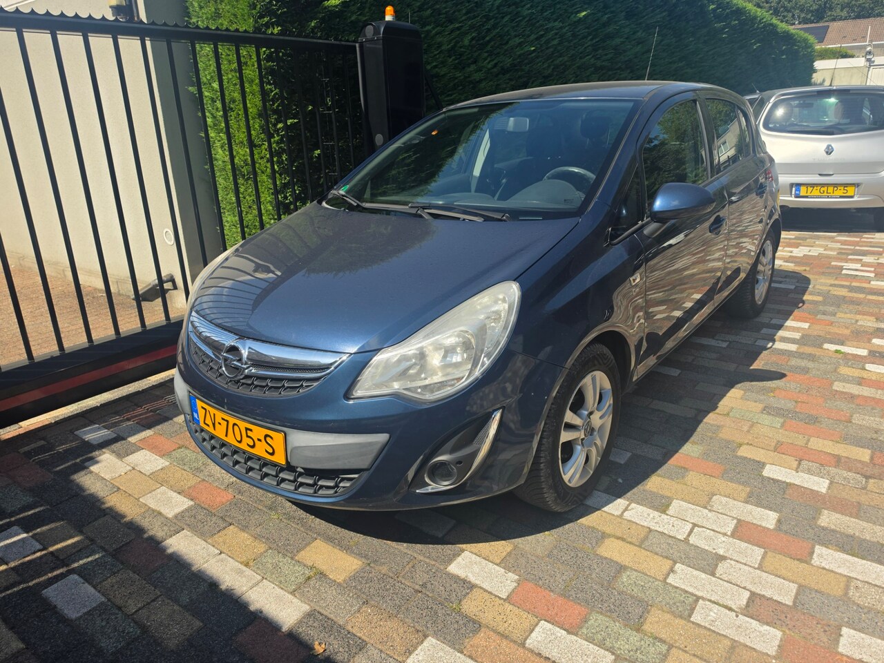 Opel Corsa - 1.2-16V Rhythm 2012 Airco Navi Cruise 5 Drs Nw Apk - AutoWereld.nl