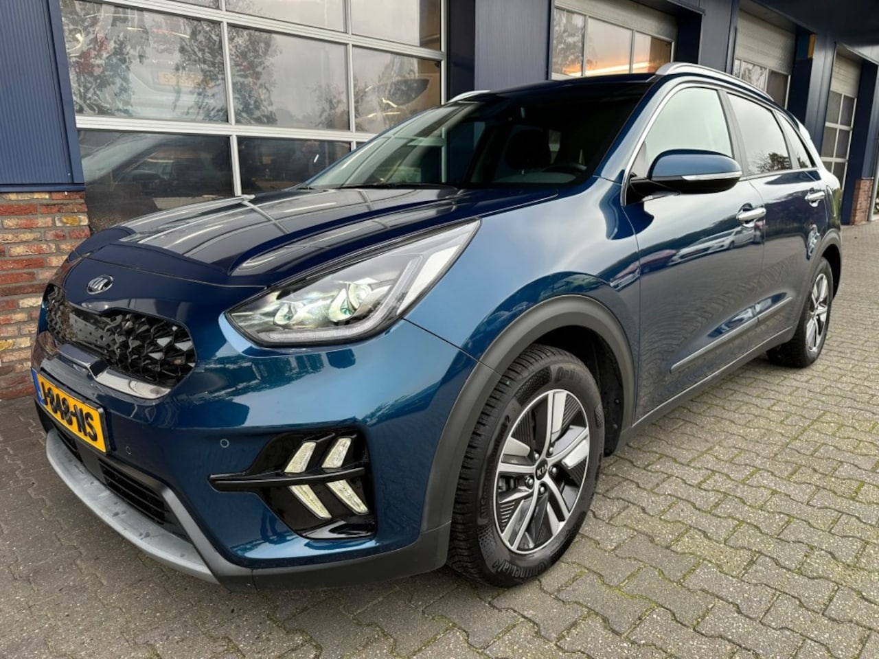 Kia Niro - 1.6 GDi Hybrid DynamicPlusLine 1.6 GDI Hybrid DynamicPlusLine, Trekhaak, Camera, Stuur/stoel verwarming, Carplay, ALL IN - AutoWereld.nl