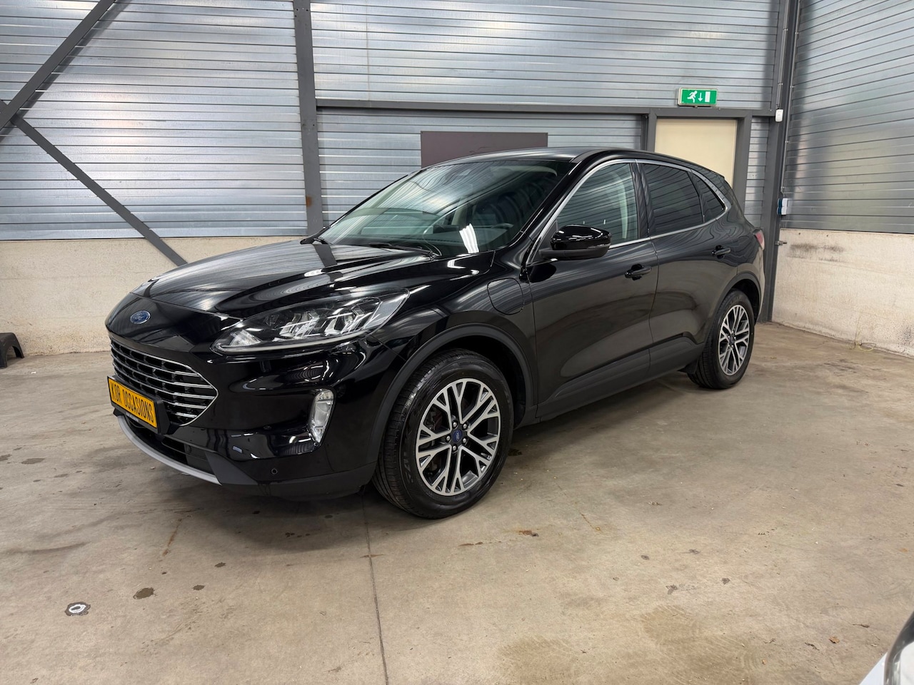 Ford Kuga - 2.5 PHEV Titanium 1ste eigenaar trekhaak dealer onderhouden - AutoWereld.nl