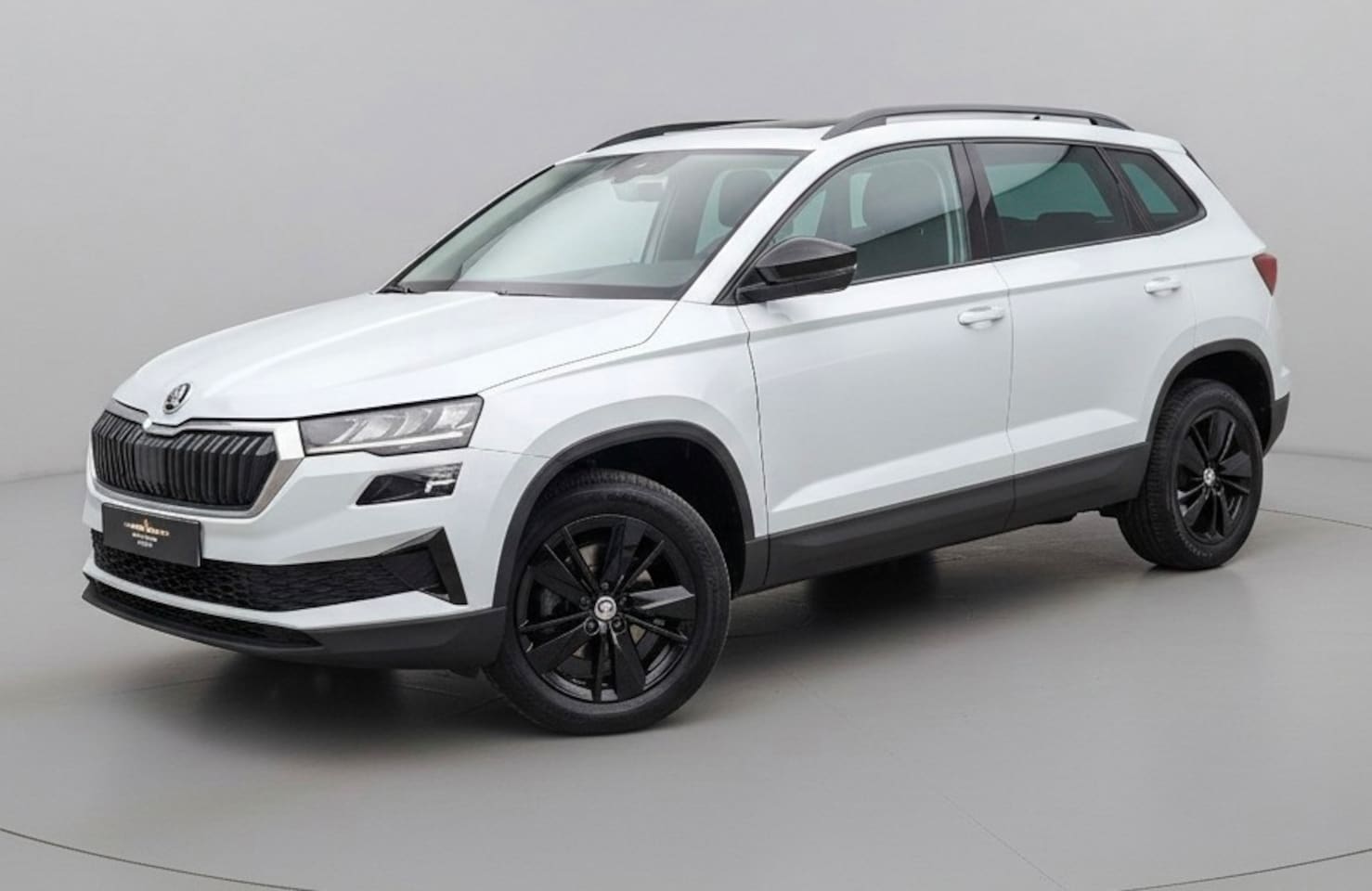 Skoda Karoq - 1.0 TSI Ambition * Panoramadak * Camera * Adaptieve Cruise Control * - AutoWereld.nl