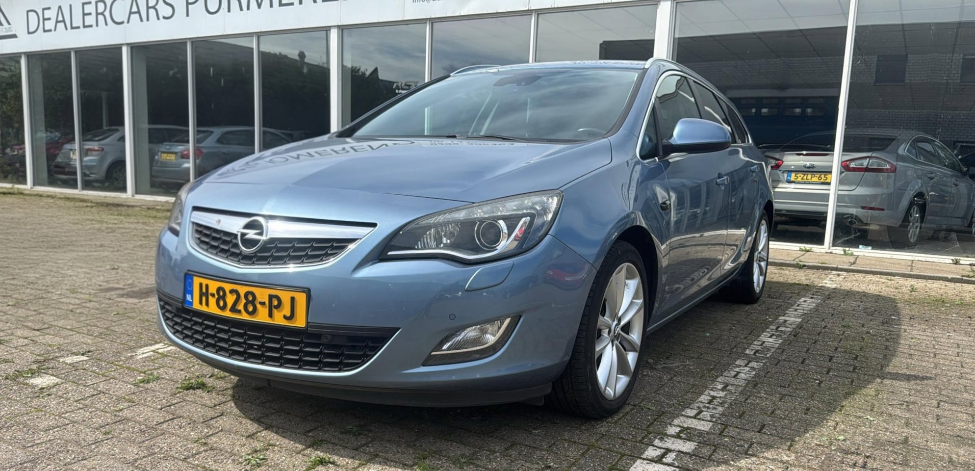 Opel Astra Sports Tourer - 1.4 Turbo Sport 1.4 Turbo Sport - AutoWereld.nl