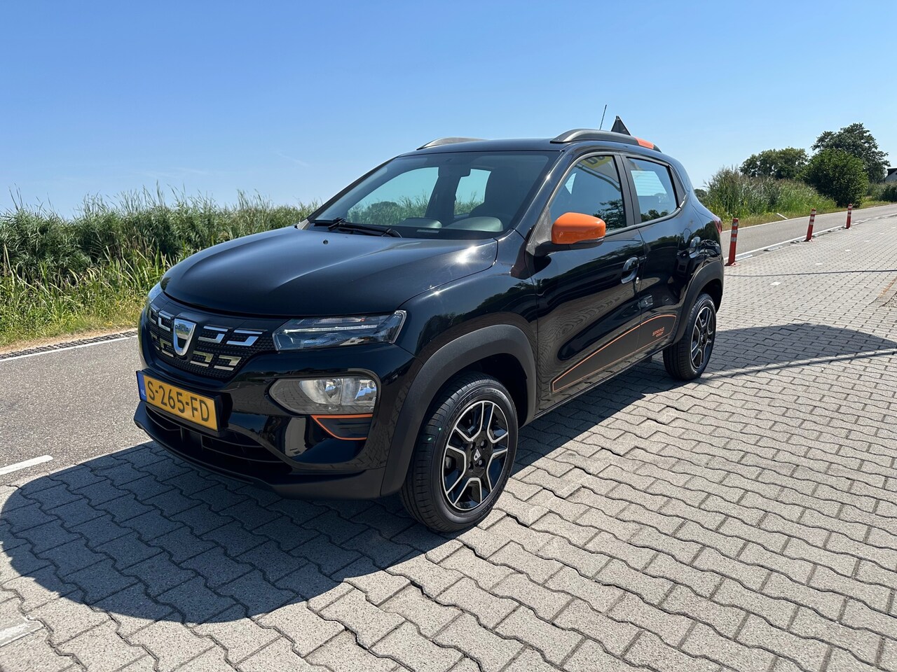 Dacia Spring - Comfort Plus 27 kWh Comfort Plus 27 kWh, Camera, Leder, Carplay, Cruisecontrol - AutoWereld.nl