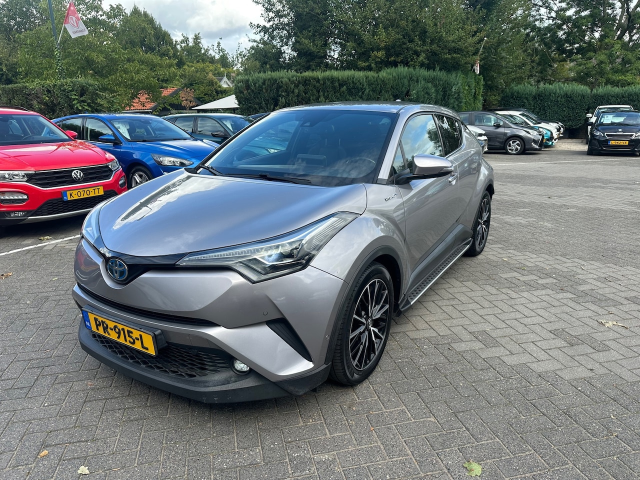 Toyota C-HR - 1.8 Hybrid Premium 1.8 Hybrid Premium , navigatie , camera , pdc , alle optie s - AutoWereld.nl