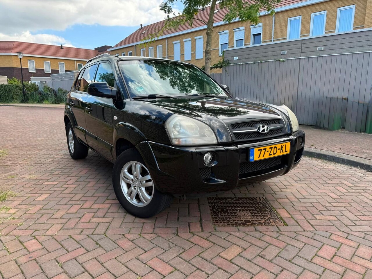 Hyundai Tucson - 2.0i Style 2.0i Style - AutoWereld.nl
