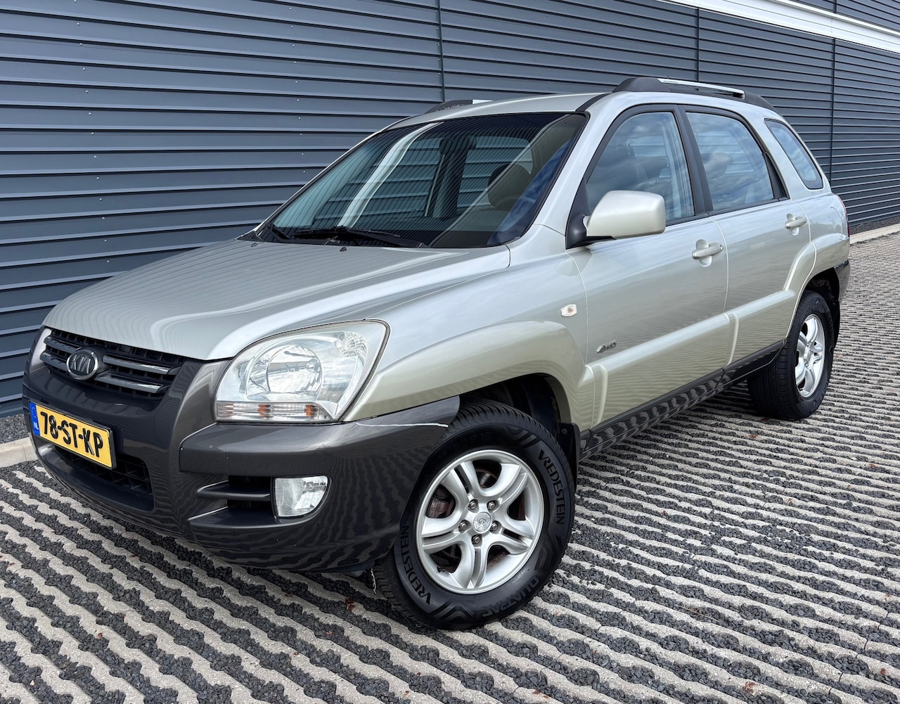 Kia Sportage - 2.0 CVVT Comfort | 4x4 4WD | Climate control - AutoWereld.nl