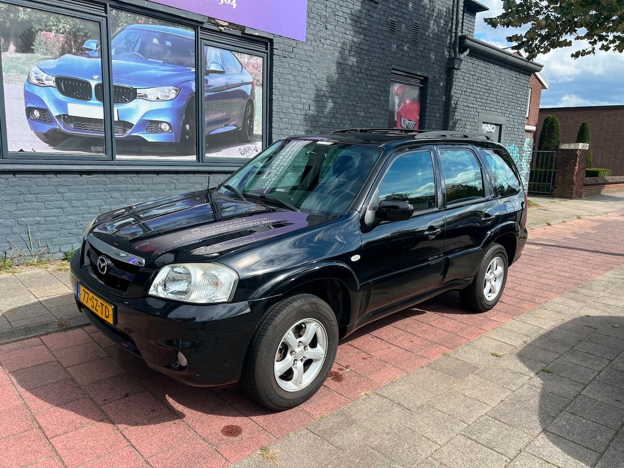 Mazda Tribute - 2.3i Touring 2.3i Touring - AutoWereld.nl
