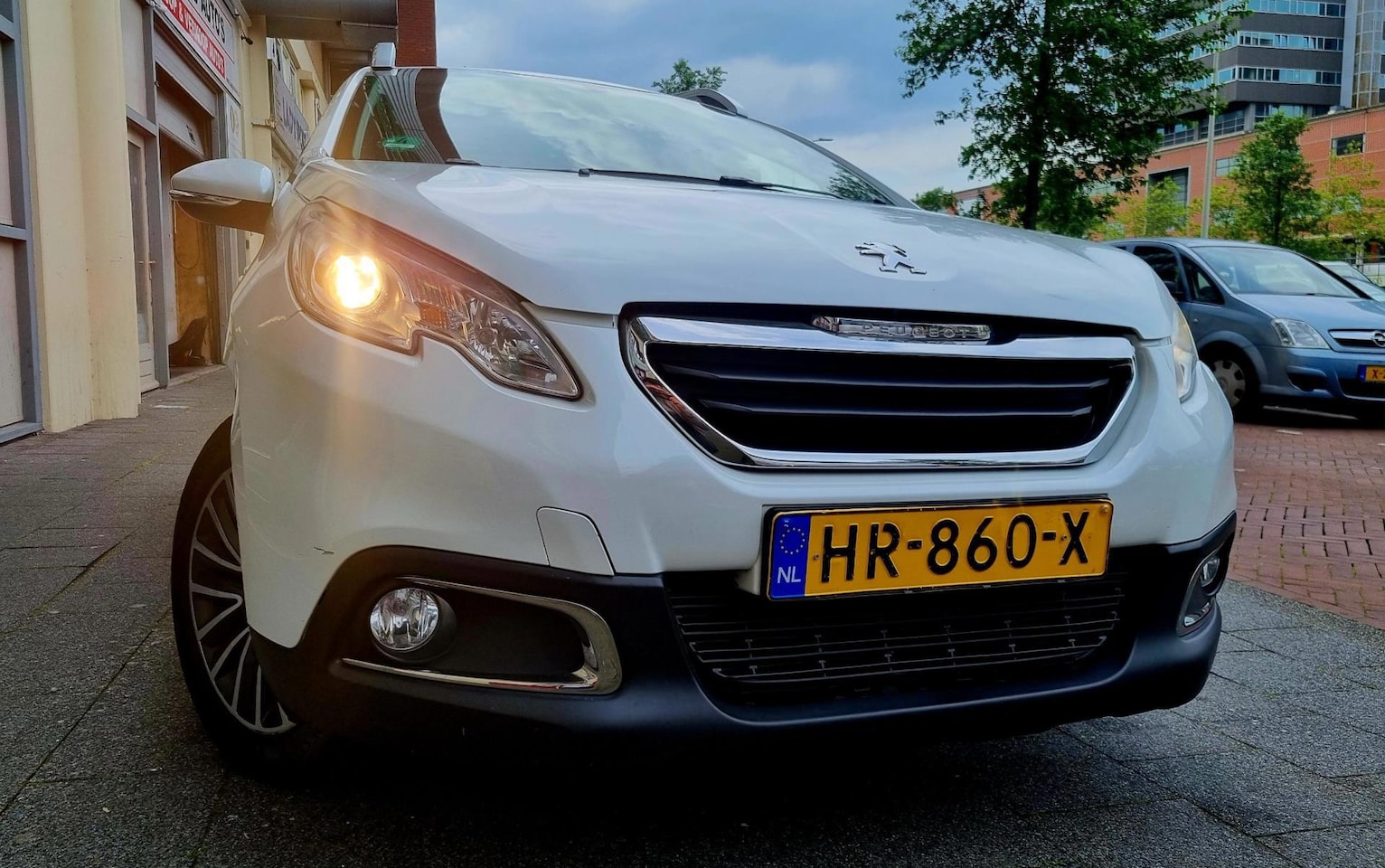 Peugeot 2008 - 1.2 VTi Active Navi Airco - AutoWereld.nl