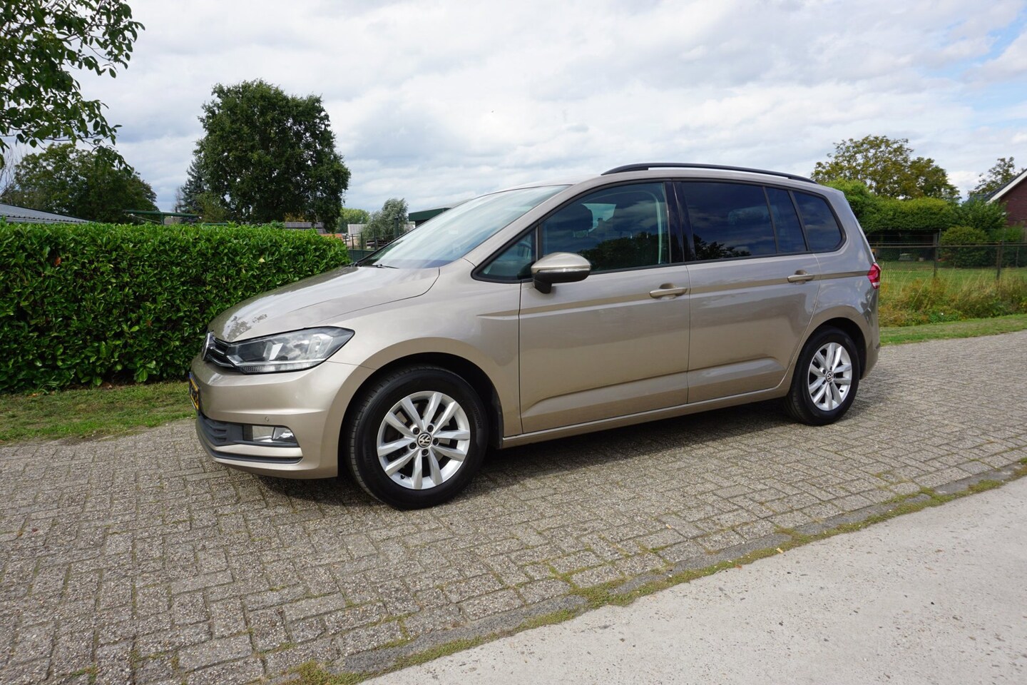 Volkswagen Touran - 1.2 TSI Comfortline 7p 1.2 TSI Comfortline 7 persoons - AutoWereld.nl