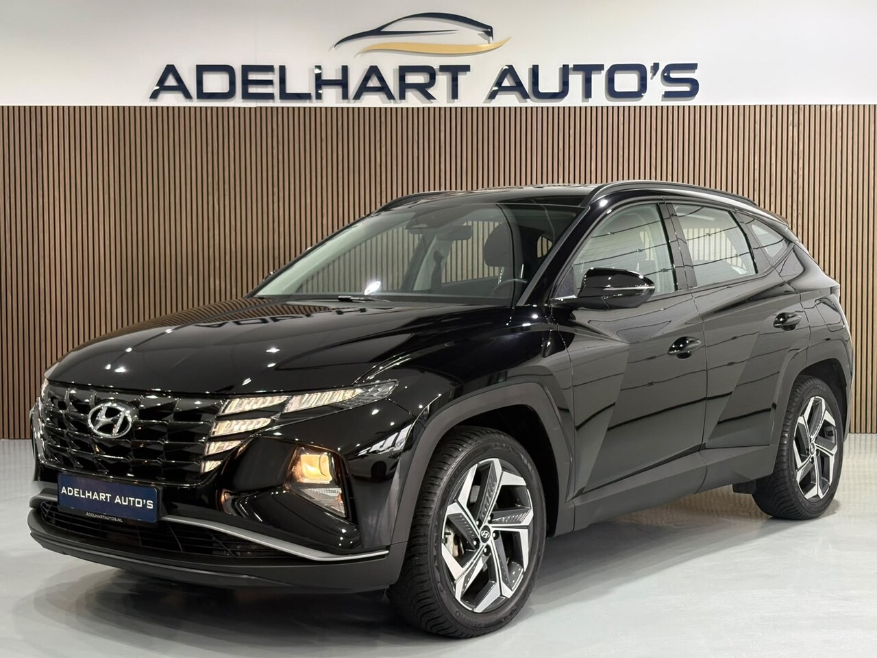 Hyundai Tucson - 1.6 T-GDI PHEV Comfort 4WD 265 PK / Navigatie full map / Camera / Cruise control / Climate - AutoWereld.nl