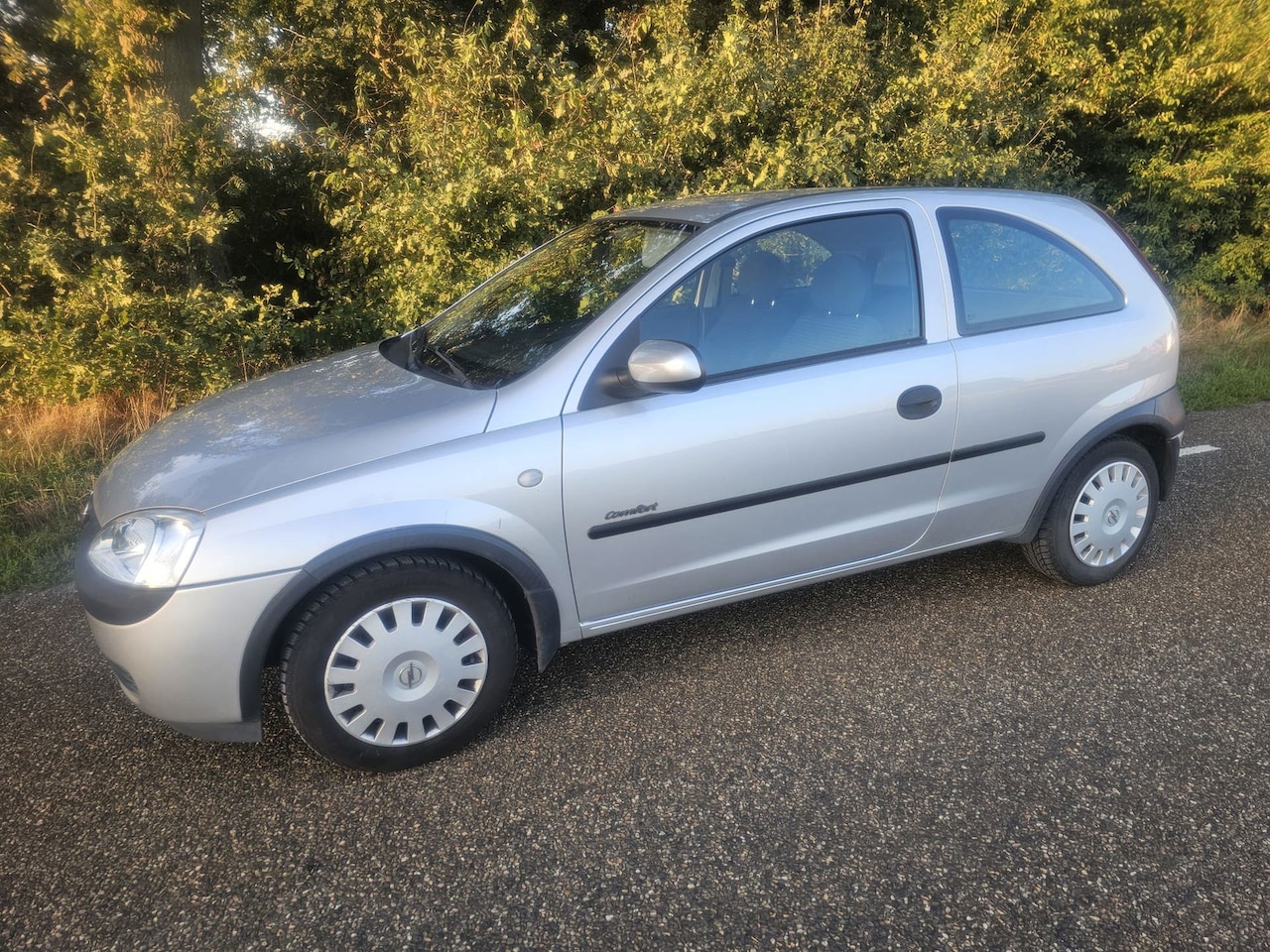 Opel Corsa - 1.2-16V Comfort LAGE KILOMETERSTAND - AutoWereld.nl