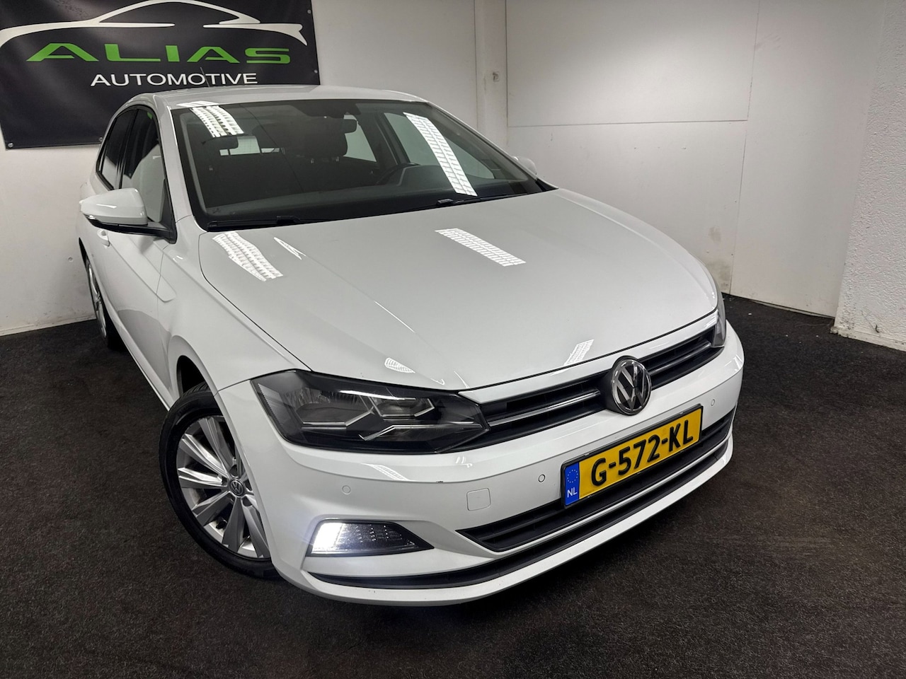 Volkswagen Polo - 1.6 TDI Comfortline Business - Carplay - Navi - Cruise - Stoel verwarming - APK 2027 - AutoWereld.nl