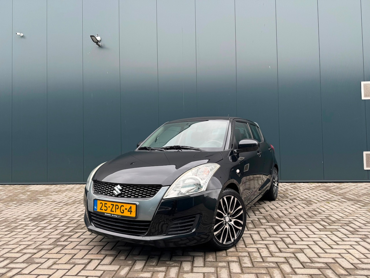 Suzuki Swift - 1.2 Comfort EASSS Sport-Line AIRCO | NAP | CRUISE | STOELVERWARMING - AutoWereld.nl