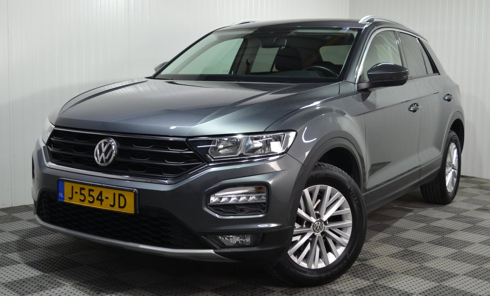 Volkswagen T-Roc - 1.5 TSI Style Business / Carplay / Adap. cruise / Pdc / NL auto / 1 eigenaar - AutoWereld.nl