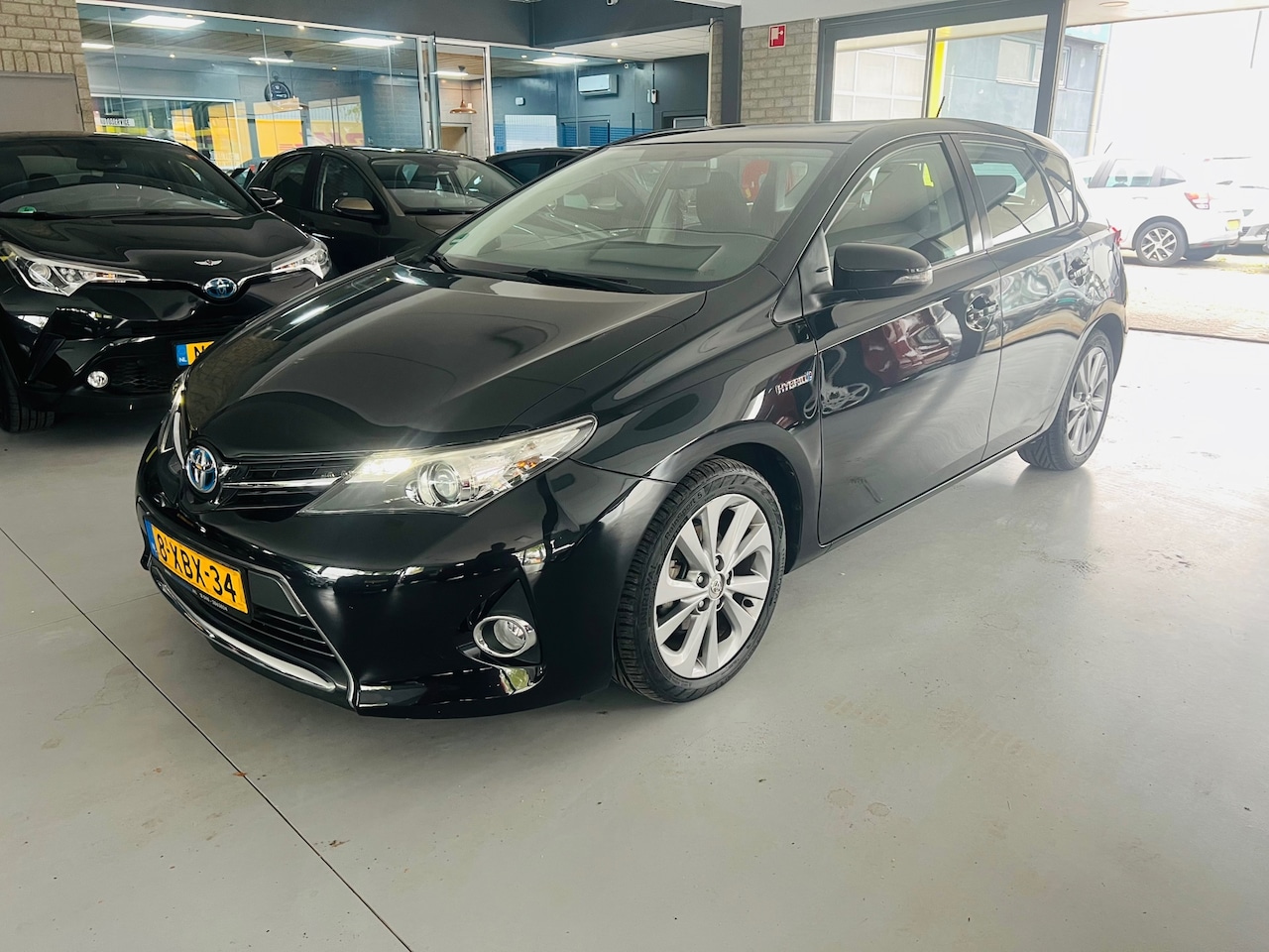 Toyota Auris - 1.8 Hybrid Executive 1.8 Hybrid Executive - AutoWereld.nl