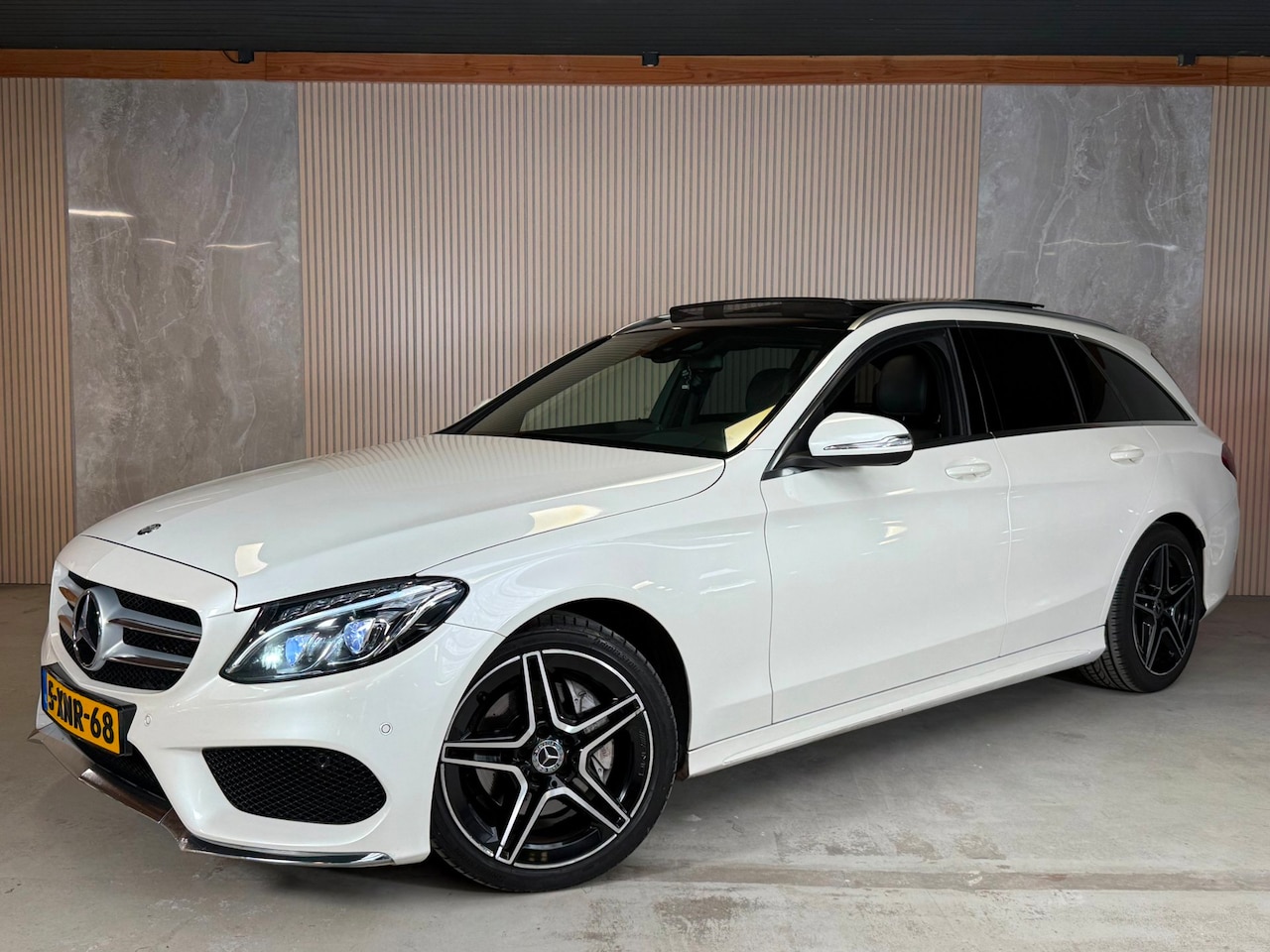 Mercedes-Benz C-klasse Estate - 180 Ambition AMG Pano Head-Up Airco Cruise Control - AutoWereld.nl