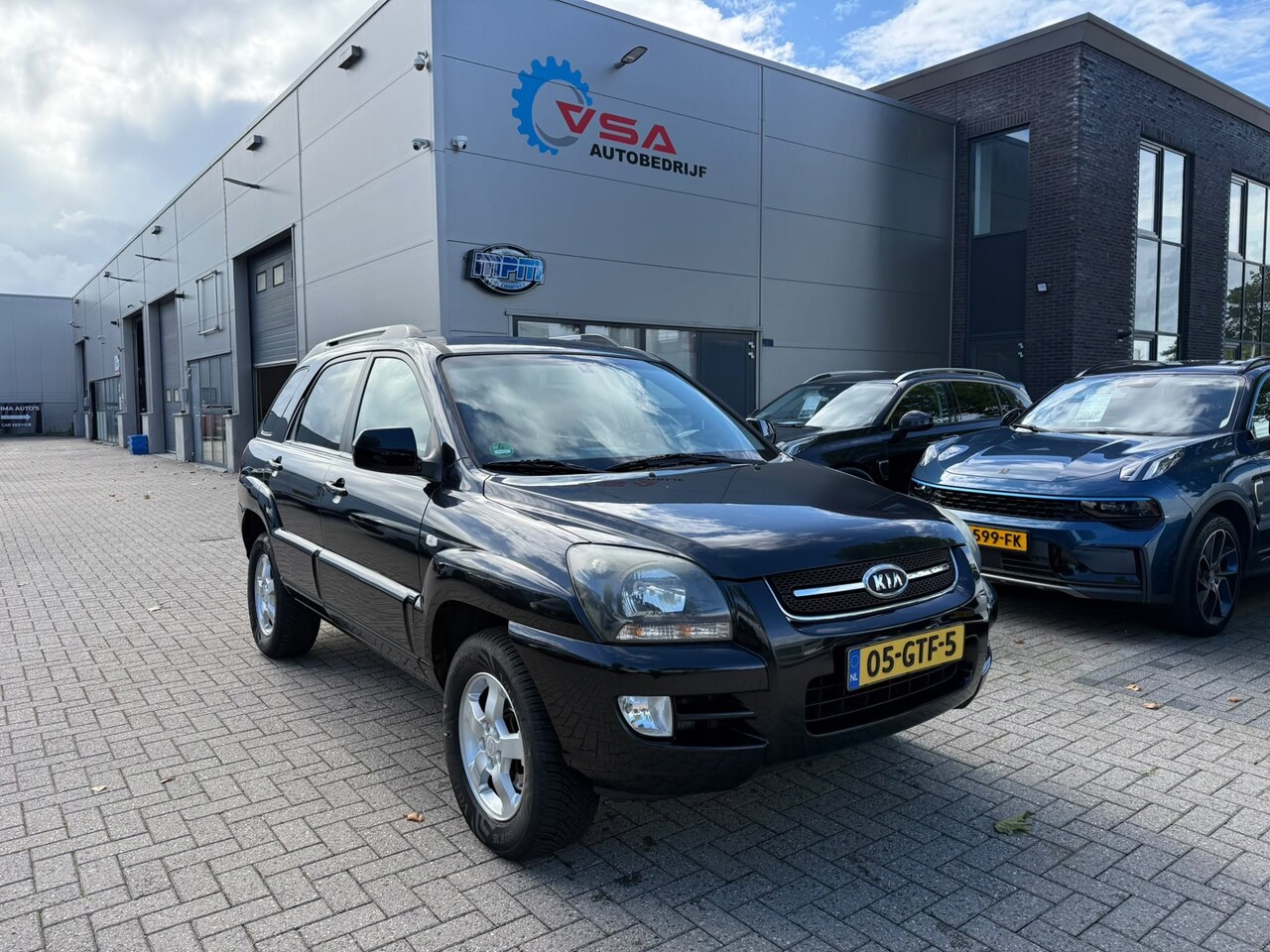 Kia Sportage - 2.0 CVVT X-tra|NAP|Leder|Climate|Cruise|4-seizoen banden|goed onderhouden|NL auto - AutoWereld.nl
