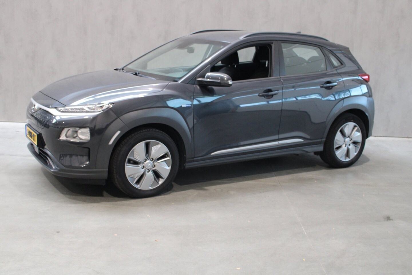 Hyundai Kona Electric - EV Comfort 64 kWh Camera/Carplay 97.5% SOH Prijs is rijklaar incl Bovag - AutoWereld.nl