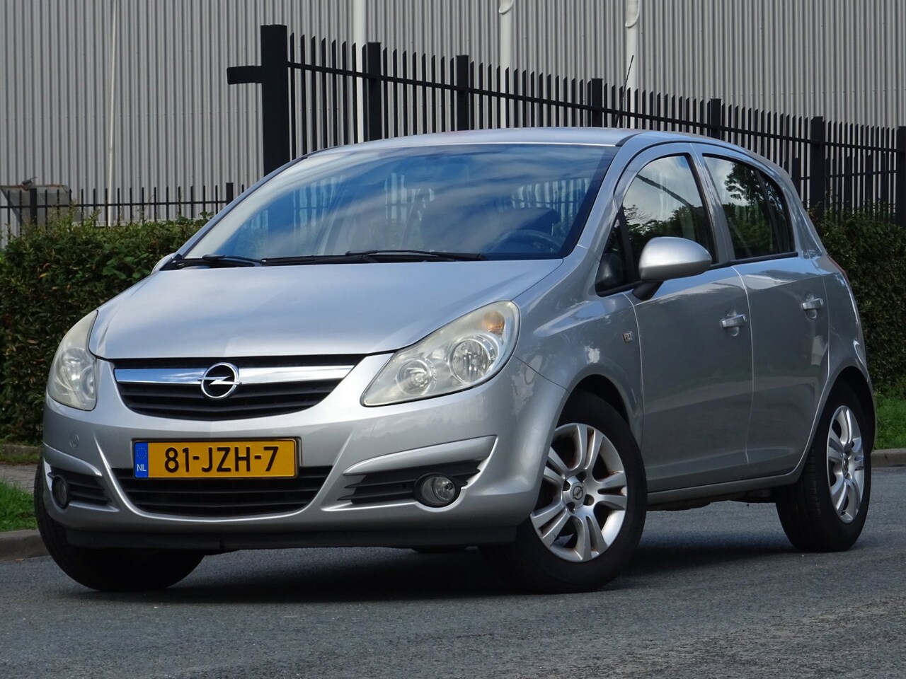 Opel Corsa - 1.2-16V Enjoy 5DRS 83DKM/NAP/AIRCO/CRUISE/APK - AutoWereld.nl