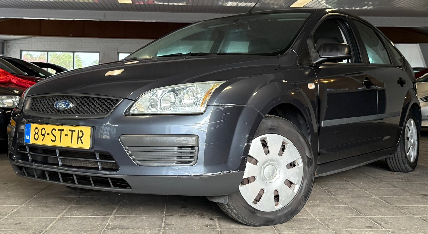 Ford Focus - 1.6-16V Champion|NAP|APK10-27|CruiseCntrl|Airco|Trekhaak|Elekramen| - AutoWereld.nl