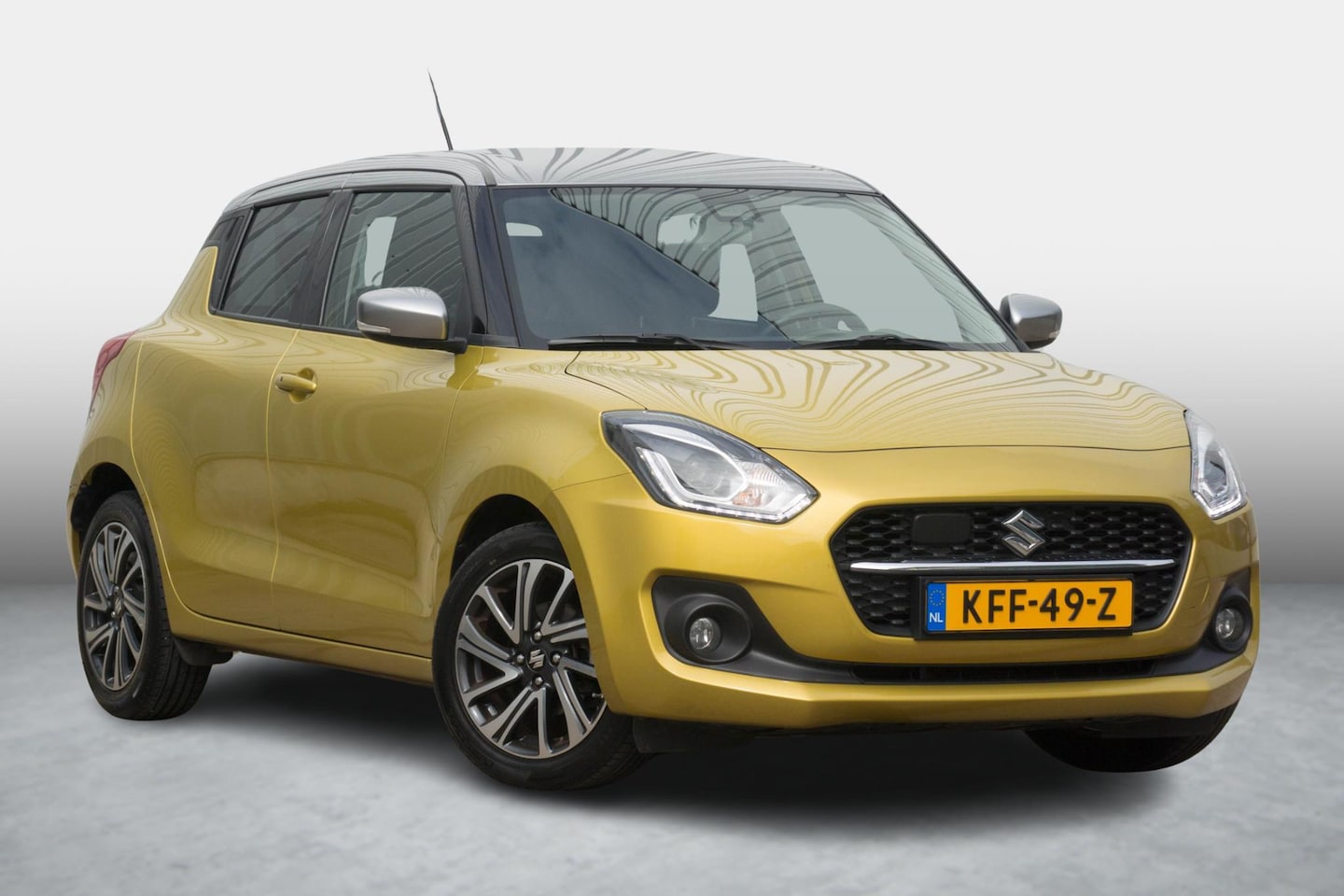 Suzuki Swift - 1.2 Style Hybrid BI-TONE - AutoWereld.nl