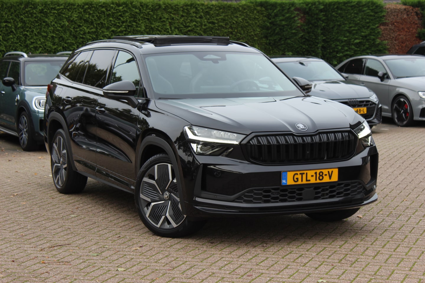 Skoda Kodiaq - 1.5 TSI PHEV Sportline Business / Panoramadak / Camera / Keyless / Memory seats / Matrix L - AutoWereld.nl