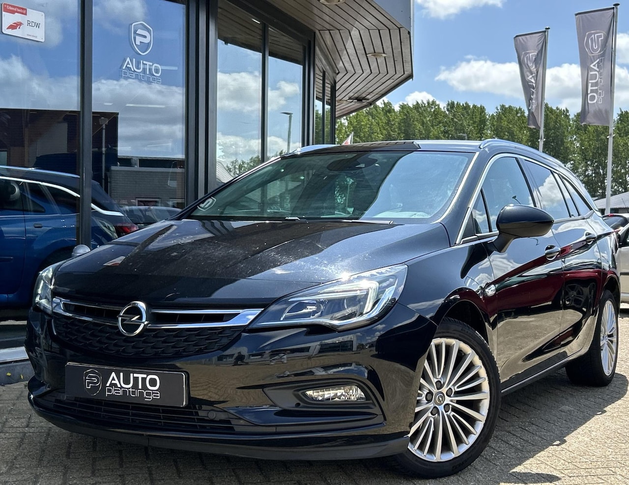 Opel Astra Sports Tourer - 1.4 Innovation 150PK | 2e Eigenaar | NL AUTO | NAP | Achteruitrijcamera | Elektrische Trek - AutoWereld.nl
