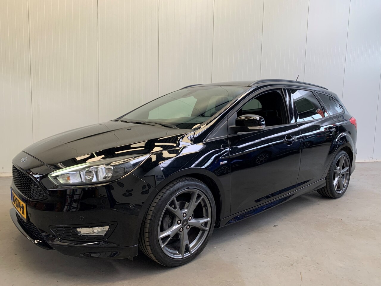 Ford Focus Wagon - 1.0 ST-Line NAVIGATIE-AIRCO/ECC-PARC.FUNCTIE-PDC-CRUISE CONTROL - AutoWereld.nl